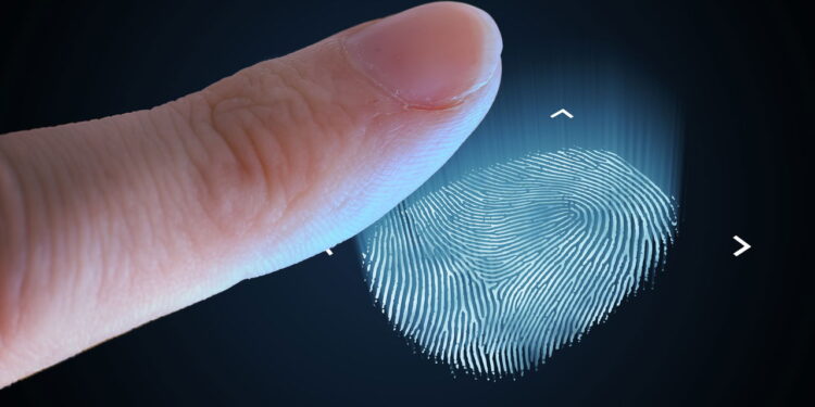 Scanning fingerprint from finger. Biometric and security concept.